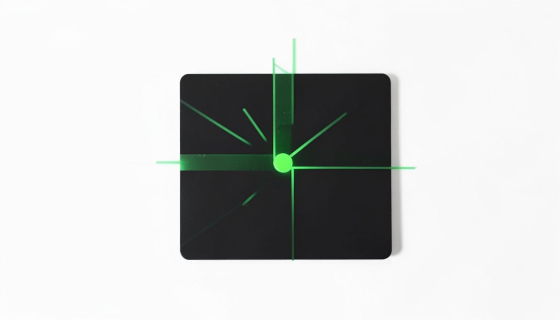 Abstract icon representing laser cutting, green line slicing through a dark square